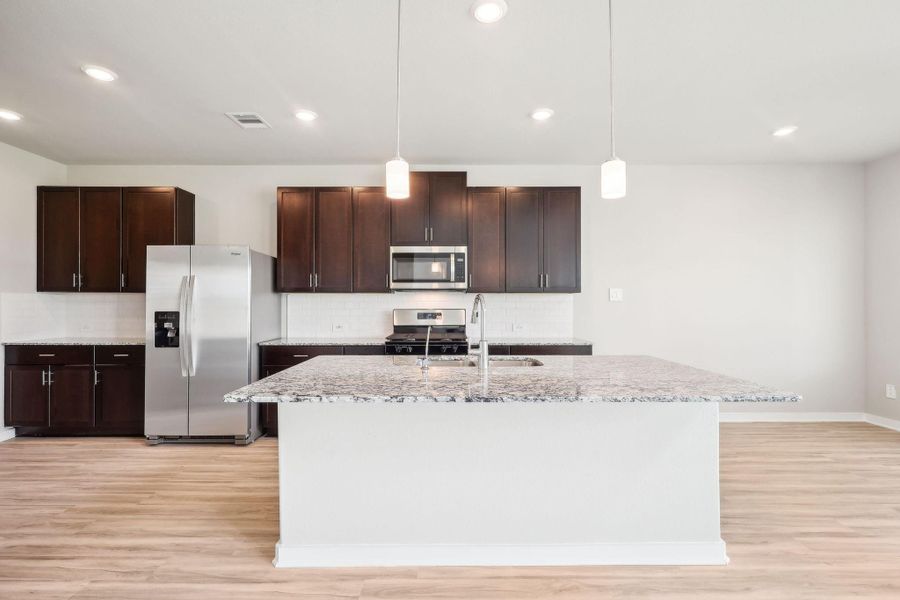 Photo is not of the actual home, but is an inspirational photo of builder’s model home and may depict options, furnishings, and/or decorator features that are not included