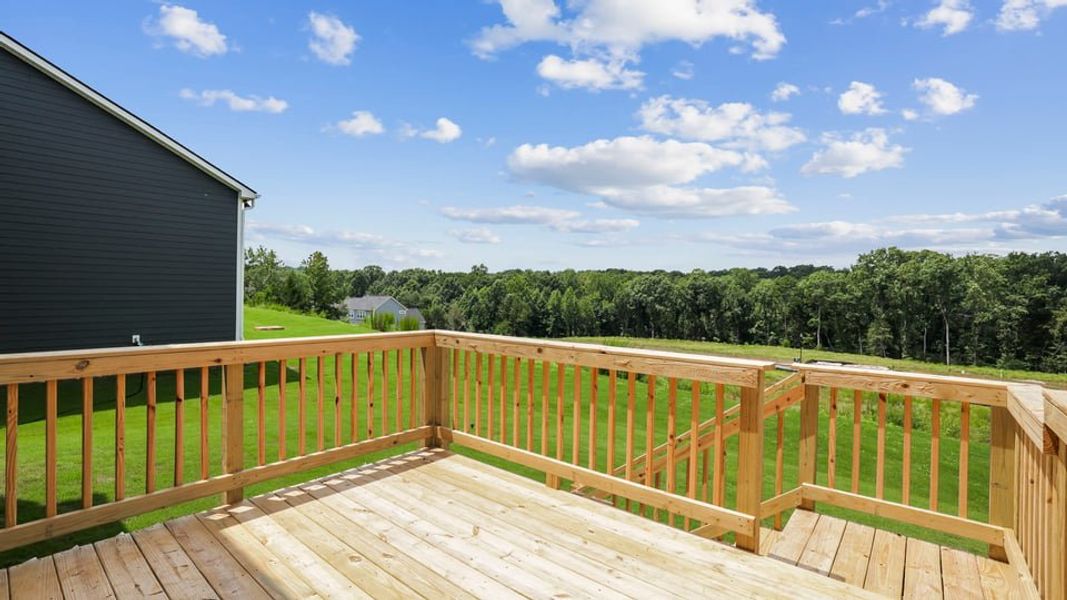 Exterior details and patio area of a home in Sunset Summits, Spartanburg (Image 18).