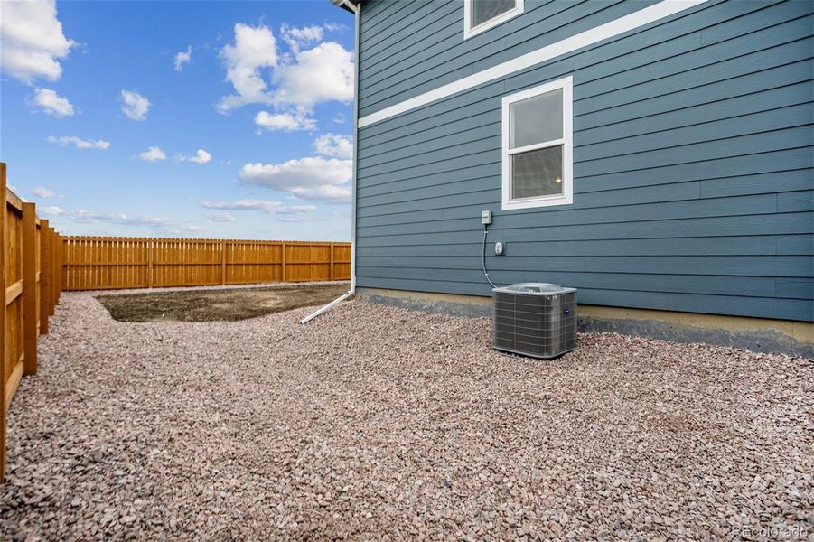Exterior details and patio area of a home in The Ridge at Lorson Ranch, Colorado Springs (Image 21).