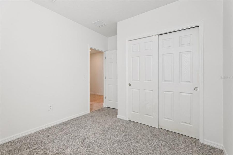 Spacious, unfurnished interior of a new home in Bradbury Creek - Signature Series, Haines City (Image 27).