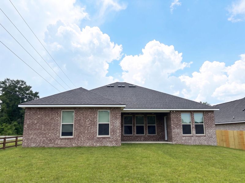 Exterior details and patio area of a home in Young Oaks, Crestview (Image 3).