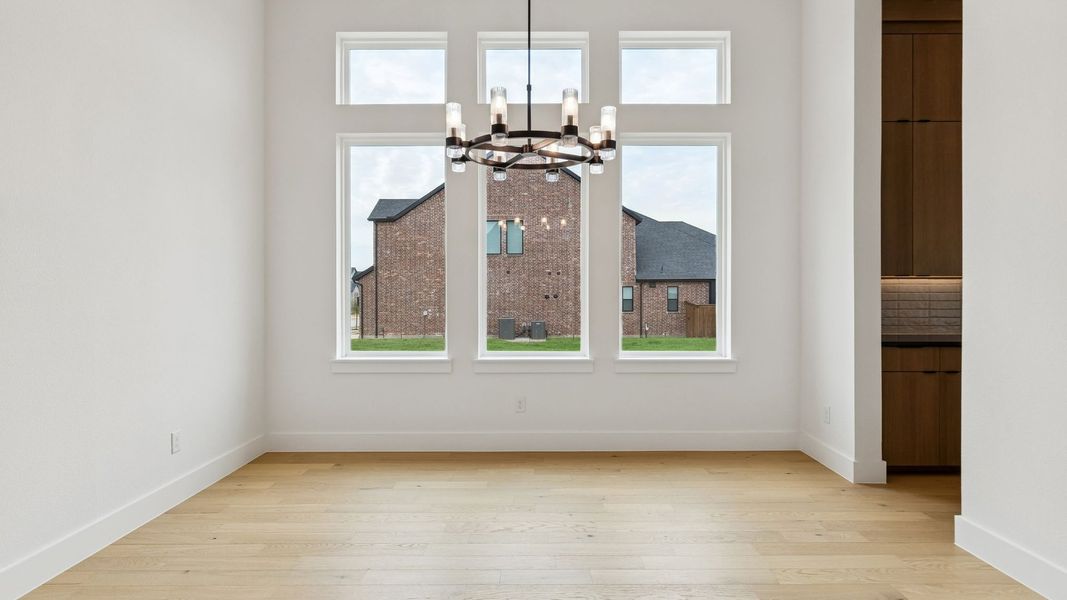 Representative unfurnished interior of a home built from the Reese II by Southgate Homes in The Reserve at Watters, Allen (Image 13).