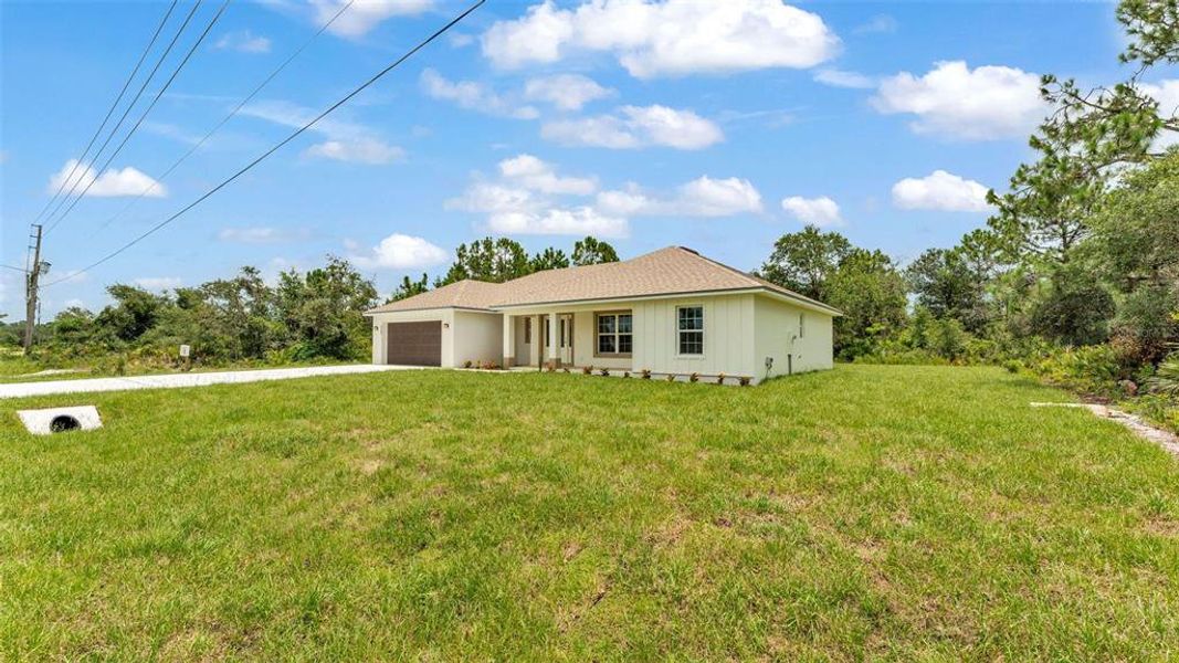 Front exterior of a new home in , Sebring, FL, highlighting curb appeal (Image 30).
