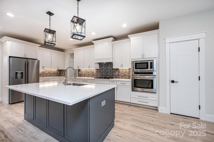 Kitchen has 2 pantries. Kitchen has 2 pantries.