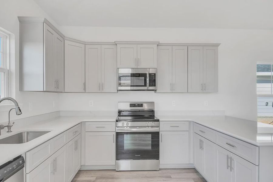 Furnished interior view inside a new home in The Bluffs at Lafayette, Freeport (Image 6). Furnished interior view inside a new home in The Bluffs at Lafayette, Freeport (Image 6).