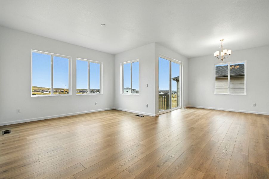 Spacious, unfurnished interior of a new home in Trailstone, Arvada (Image 18).