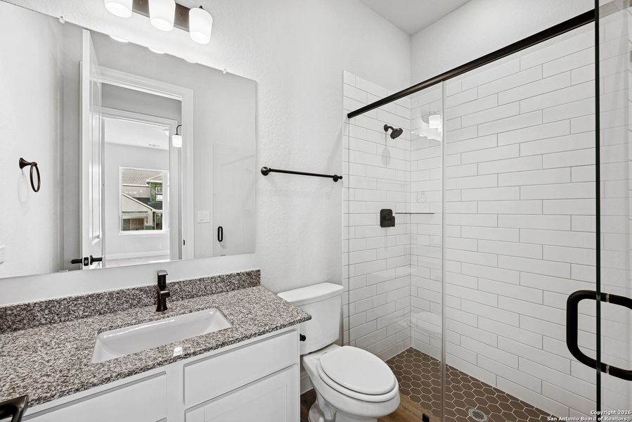 Furnished interior view inside a new home in Windsong - Legacy Series, Boerne (Image 8).