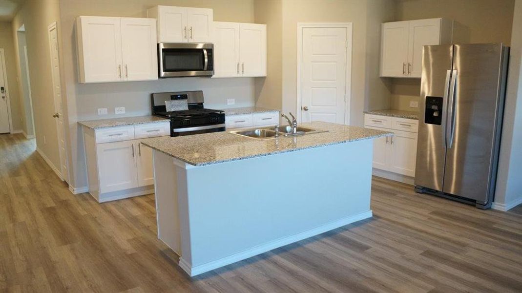 Kitchen- All Home and community information, including pricing, included features, terms, availability and amenities, are subject to change at any time without notice or obligation. All Drawings, pictures, photographs, video, square footages, floor plans, elevations, features, colors and sizes are approximate for illustration purposes only and will vary from the homes as built.