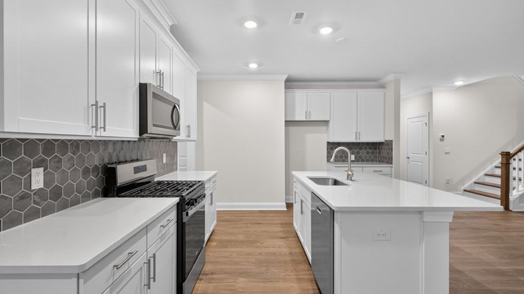 Representative furnished interior of a home built from the LAWSON by D.R. Horton in Horton Park, Apex (Image 6).