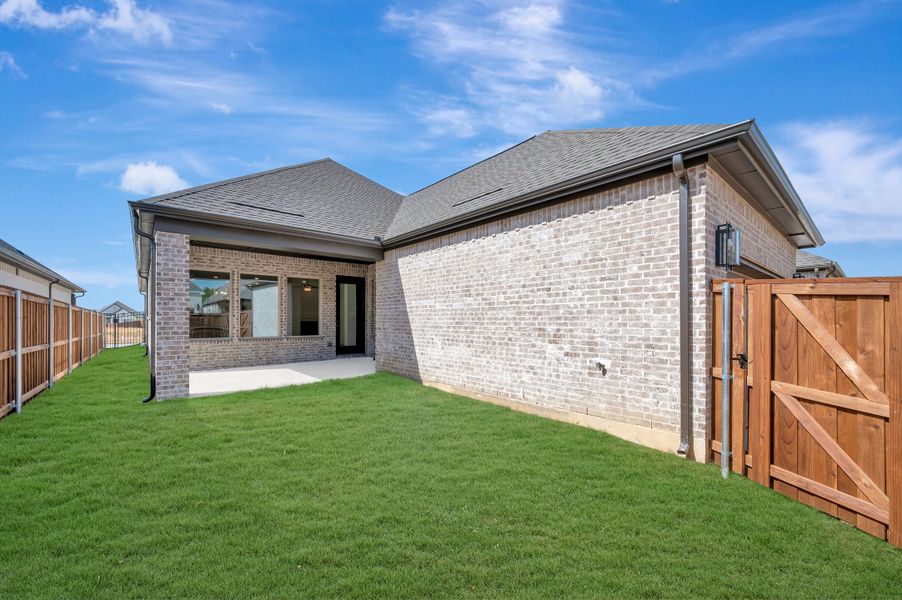 Exterior details and patio area of a home in Elements at Viridian - Signature Series, Arlington (Image 3). Exterior details and patio area of a home in Elements at Viridian - Signature Series, Arlington (Image 3).