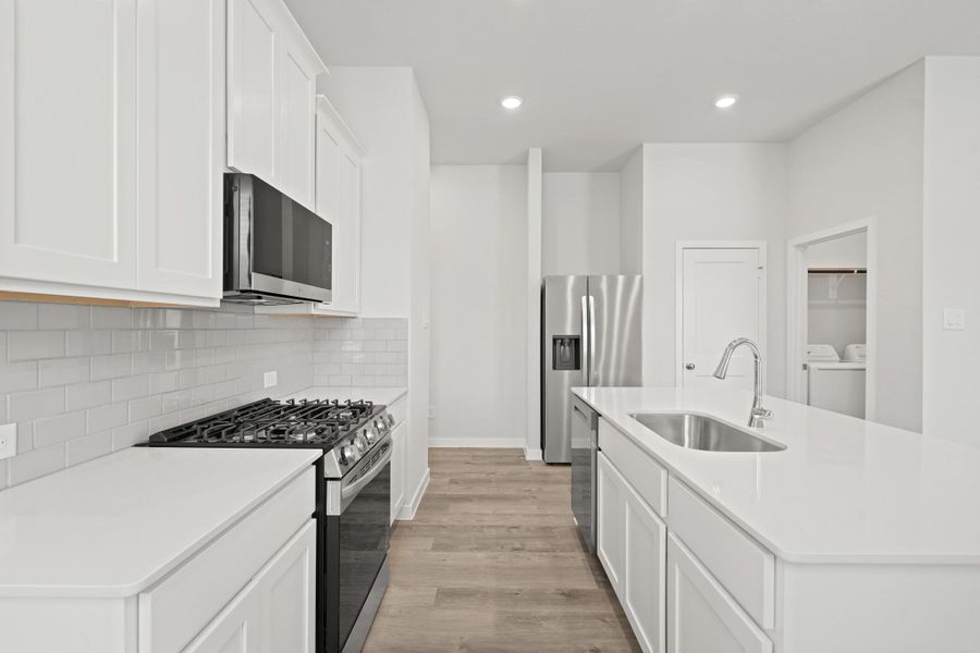Furnished interior view inside a new home in Creekland Village at Bridgeland, Cypress (Image 11).