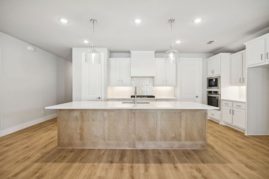 Representative furnished interior of a home built from the Adolphus by Centre Living Homes in Painted Tree Woodland West, McKinney (Image 8).