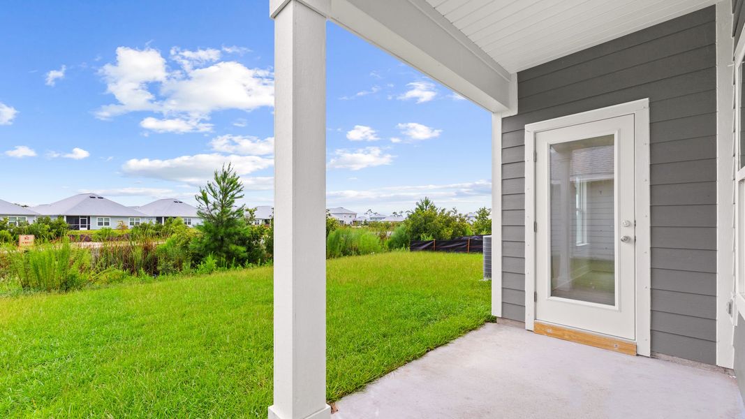 Exterior details and patio area of a home in WindMark Beach, Port Saint Joe (Image 23).