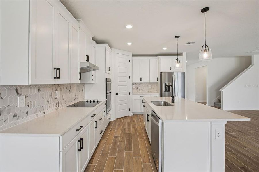 Furnished interior view inside a new home in Two Rivers - Signature Series, Zephyrhills (Image 6).