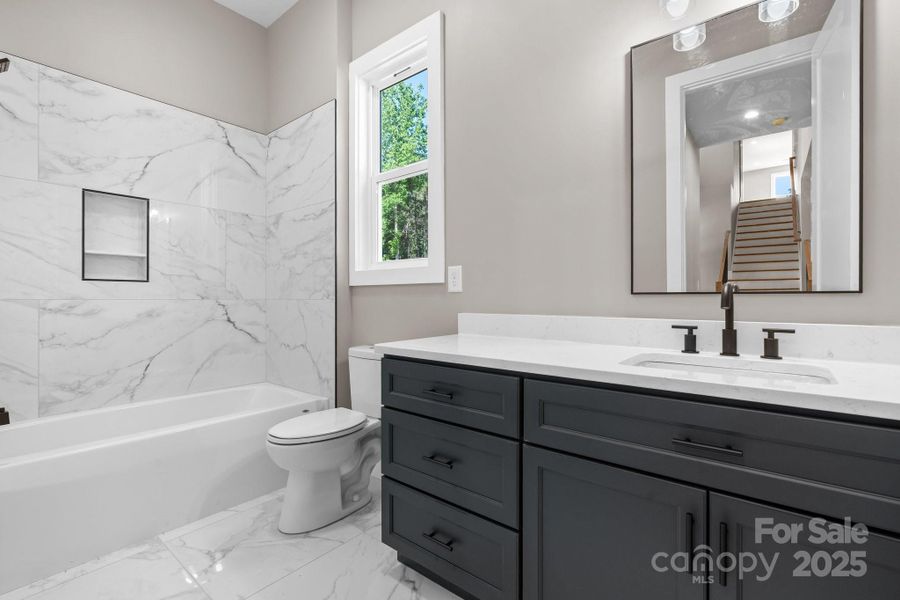 Furnished interior view inside a new home in , Hickory (Image 7).