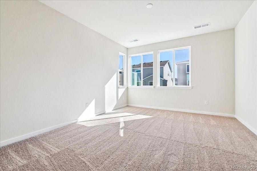 Spacious, unfurnished interior of a new home in Floret Collection at Alder Creek, Parker (Image 16).