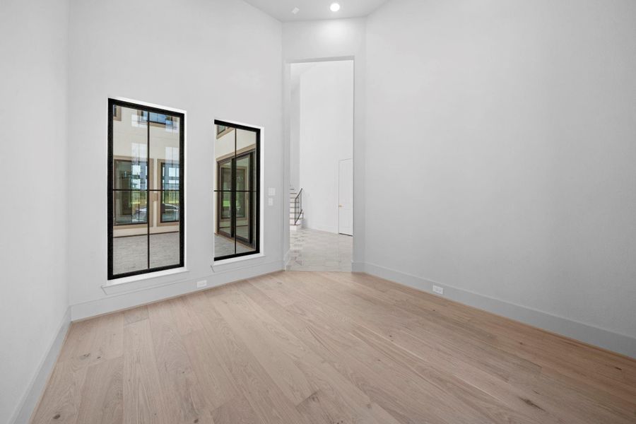 Private home office positioned off the courtyard, offering a quiet and beautifully appointed space for work or study