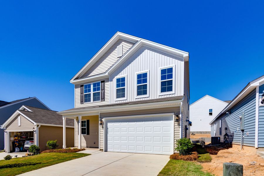 Front exterior of a new home in Bluefield, Lexington, SC, highlighting curb appeal (Image 20).