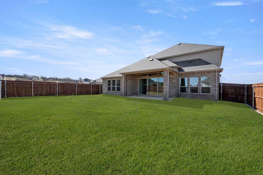 Exterior details and patio area of a home in High Country, Burleson (Image 20).