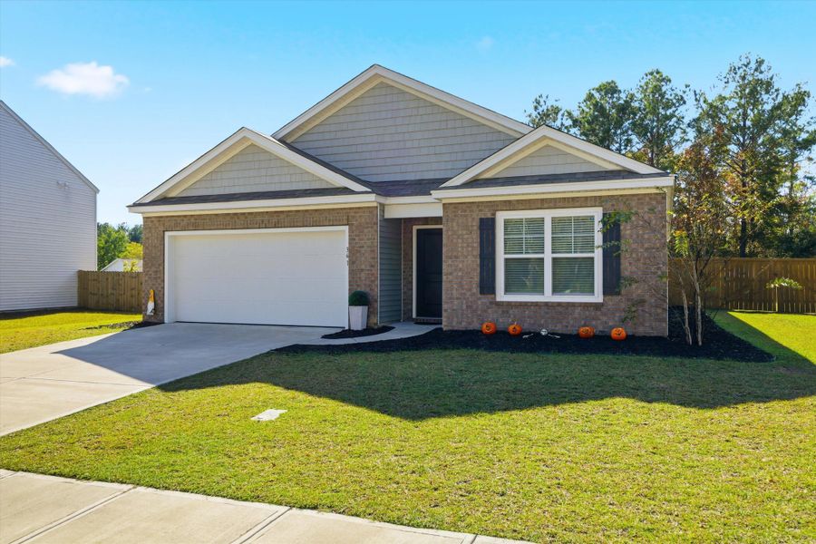 Front exterior of a new home in Stone Ridge, Moncks Corner, SC, highlighting curb appeal (Image 20).