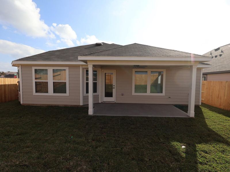 Exterior details and patio area of a home in Lone Star Landing, Montgomery (Image 20).