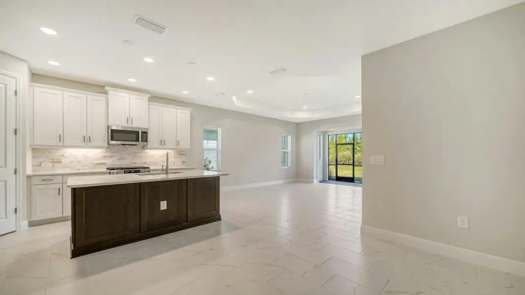 Furnished interior view inside a new home in Windward Real Estate and Homes for Sale in Sarasota, FL - Neal Communities, Sarasota (Image 14). Furnished interior view inside a new home in Windward Real Estate and Homes for Sale in Sarasota, FL - Neal Communities, Sarasota (Image 14).