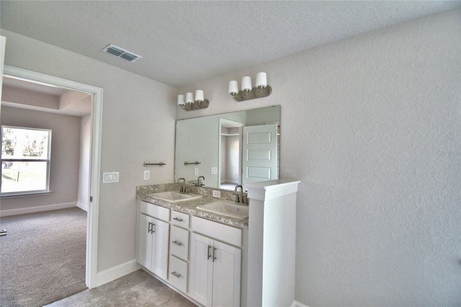 Furnished interior view inside a new home in Cadence Crossing, Auburndale (Image 11).