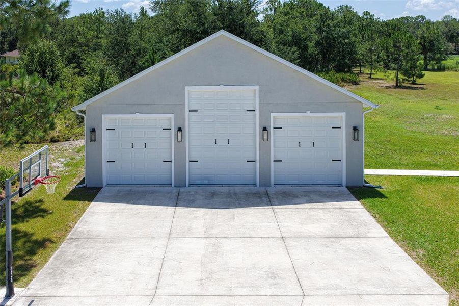 Front exterior of a new home in , Wesley Chapel, FL, highlighting curb appeal (Image 27).