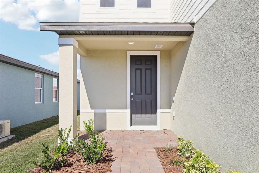 Exterior details and patio area of a home in , Poinciana (Image 3).