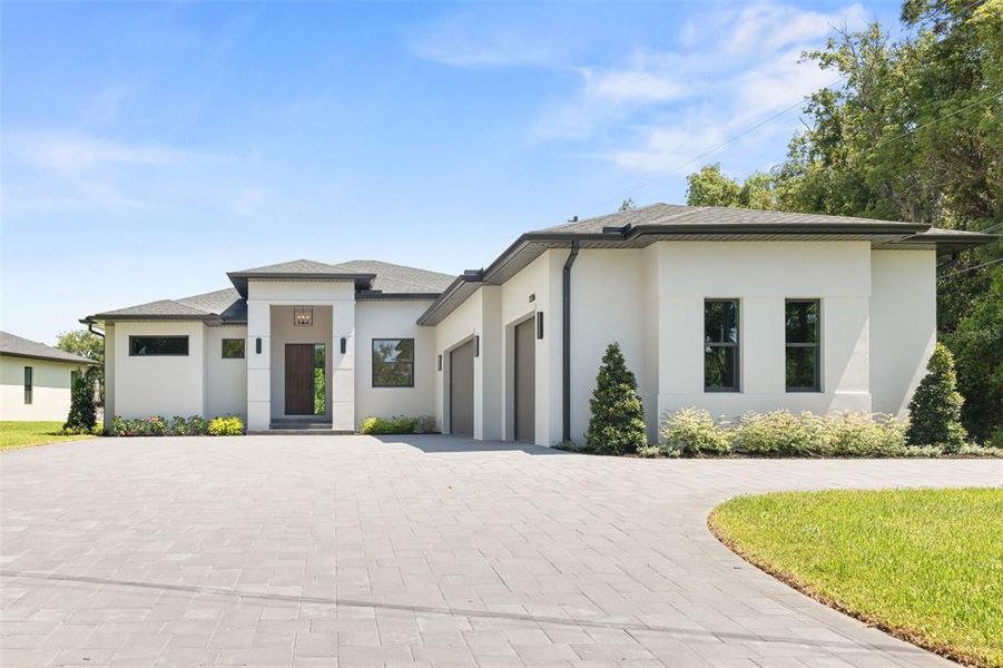 Front exterior of a new home in , Tarpon Springs, FL, highlighting curb appeal (Image 2). Front exterior of a new home in , Tarpon Springs, FL, highlighting curb appeal (Image 2).