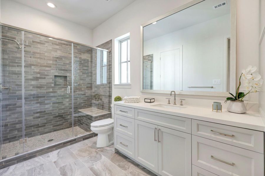 *Previous Model Home* Representative of a secondary bedroom  ensuite bath.