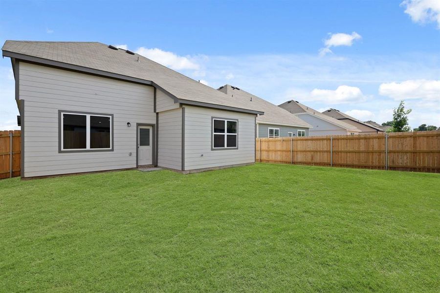 Front exterior of a new home in Sycamore Landing, Fort Worth, TX, highlighting curb appeal (Image 2). Front exterior of a new home in Sycamore Landing, Fort Worth, TX, highlighting curb appeal (Image 2).