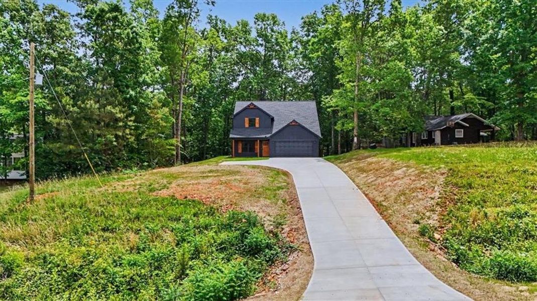 Front exterior of a new home in , Emerson, GA, highlighting curb appeal (Image 17).