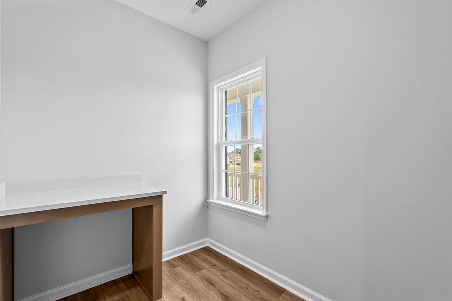 Spacious, unfurnished interior of a new home in Lilah Grove, Summerfield (Image 51).