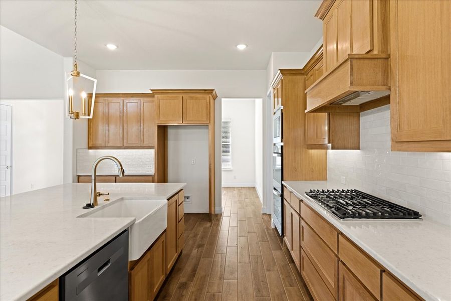 Representative furnished interior of a home built from the The Braden II by Doug Parr Custom Homes in Kessler Farms, Brock (Image 9).