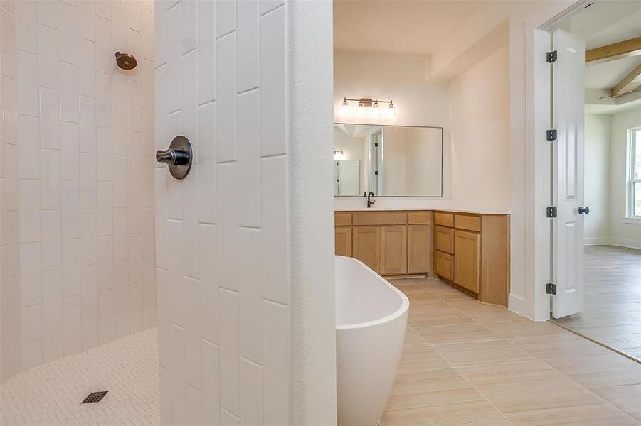 Bathroom with vanity, independent shower and bath, and tile patterned floors