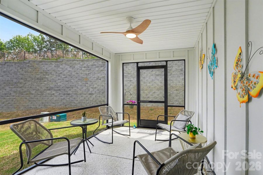 Exterior details and patio area of a home in Smith Village Townhomes, Troutman (Image 3).
