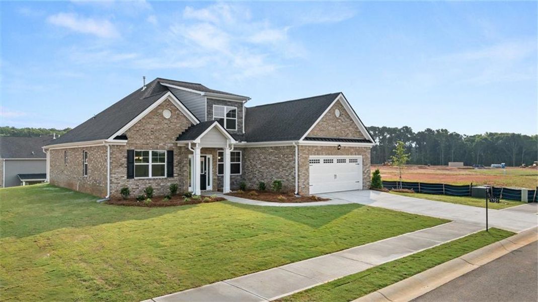 Front exterior of a new home in Westland, Bogart, GA, highlighting curb appeal (Image 18). Front exterior of a new home in Westland, Bogart, GA, highlighting curb appeal (Image 18).