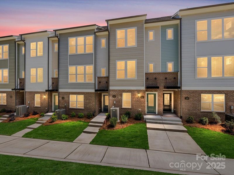 Front exterior of a new home in Central Living at Craig, Charlotte, NC, highlighting curb appeal (Image 23).