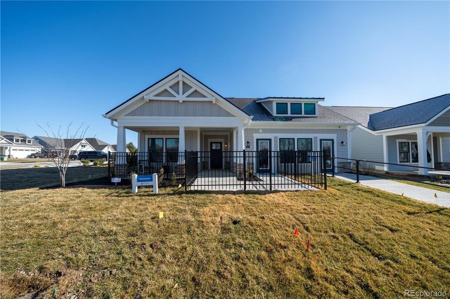 Front exterior of a new home in , Fort Lupton, CO, highlighting curb appeal (Image 2). Front exterior of a new home in , Fort Lupton, CO, highlighting curb appeal (Image 2).