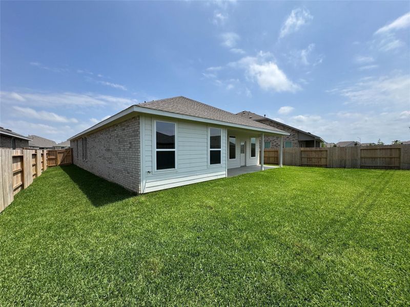Exterior details and patio area of a home in Anniston, Katy (Image 22).