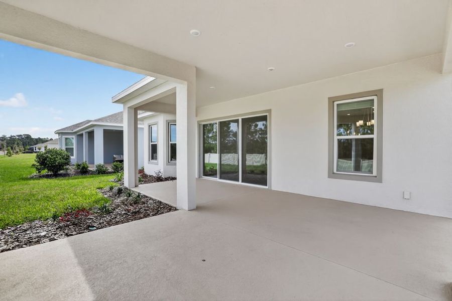 Exterior details and patio area of a home in Center Lake Ranch Community Group Page, St. Cloud (Image 4).