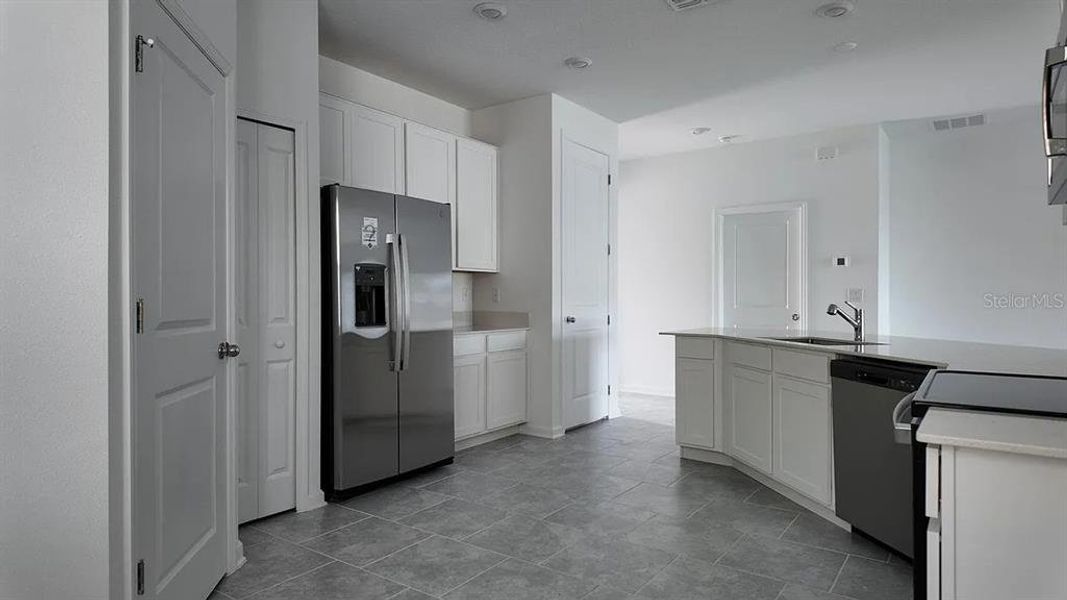 Furnished interior view inside a new home in Cascades: Grand Collection, Davenport (Image 4).