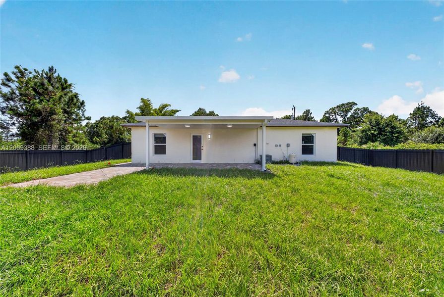 Exterior details and patio area of a home in , Lehigh Acres (Image 19).