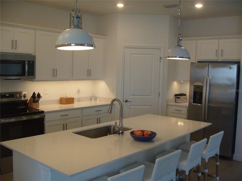 Furnished interior view inside a new home in , Port Charlotte (Image 8).