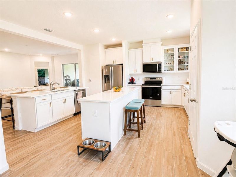 Furnished interior view inside a new home in Crystal Bay Estates, Grant-Valkaria (Image 7).