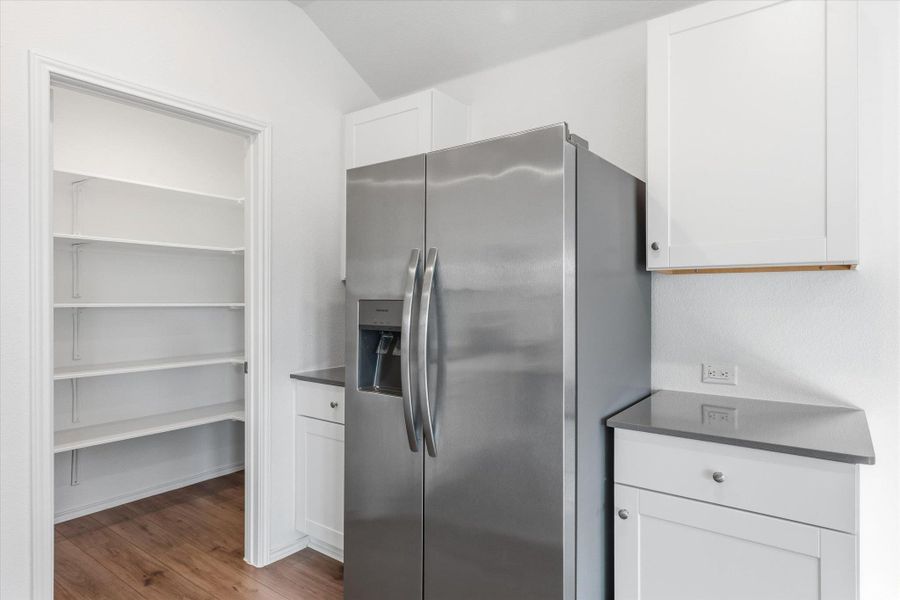 Furnished interior view inside a new home in Thunder Rock: Watermill Collection, Marble Falls (Image 12).