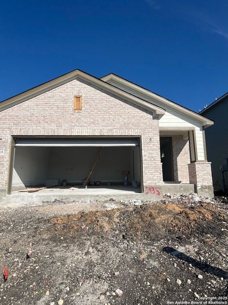Front exterior of a new home in Fairway Crossing, Converse, TX, highlighting curb appeal (Image 2). Front exterior of a new home in Fairway Crossing, Converse, TX, highlighting curb appeal (Image 2).