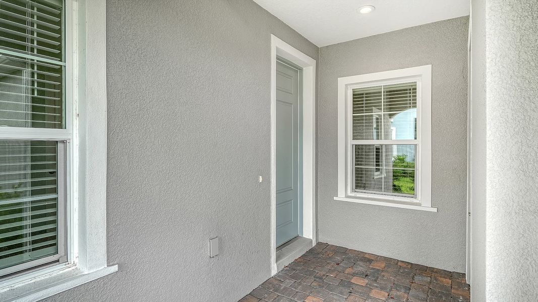 Exterior details and patio area of a home in Wildleaf Real Estate and Homes for Sale in Parrish, FL - Neal Communities, Parrish (Image 4). Exterior details and patio area of a home in Wildleaf Real Estate and Homes for Sale in Parrish, FL - Neal Communities, Parrish (Image 4).