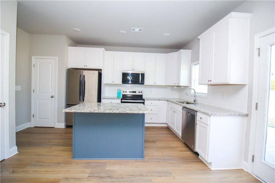 Furnished interior view inside a new home in , Commerce (Image 7).